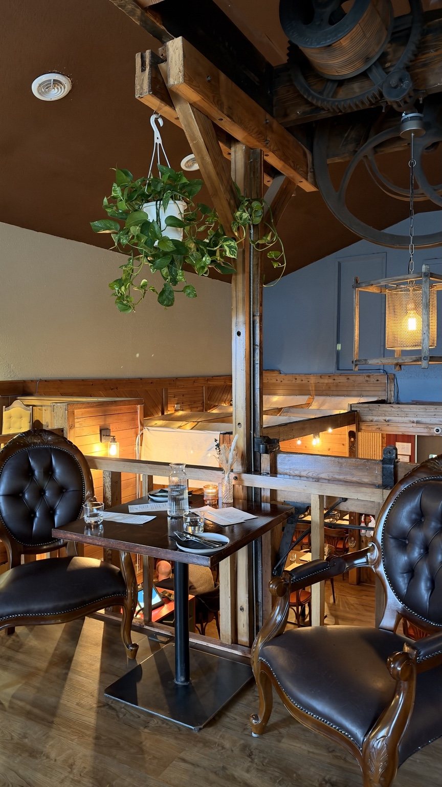The cozy upstairs lounge at The Rumour Mill